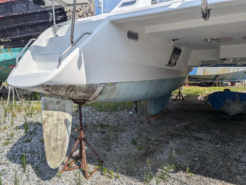Slide: The Image of Shuttleworth Ocean Cheetah 37 catamaran, 1998 model, on dry dock with visible keel and rudder. - 39