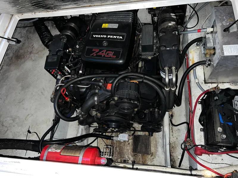 Slide: The Image of 1997 Four Winns 258 Vista engine compartment with Volvo Penta 7.4GL motor. - 32