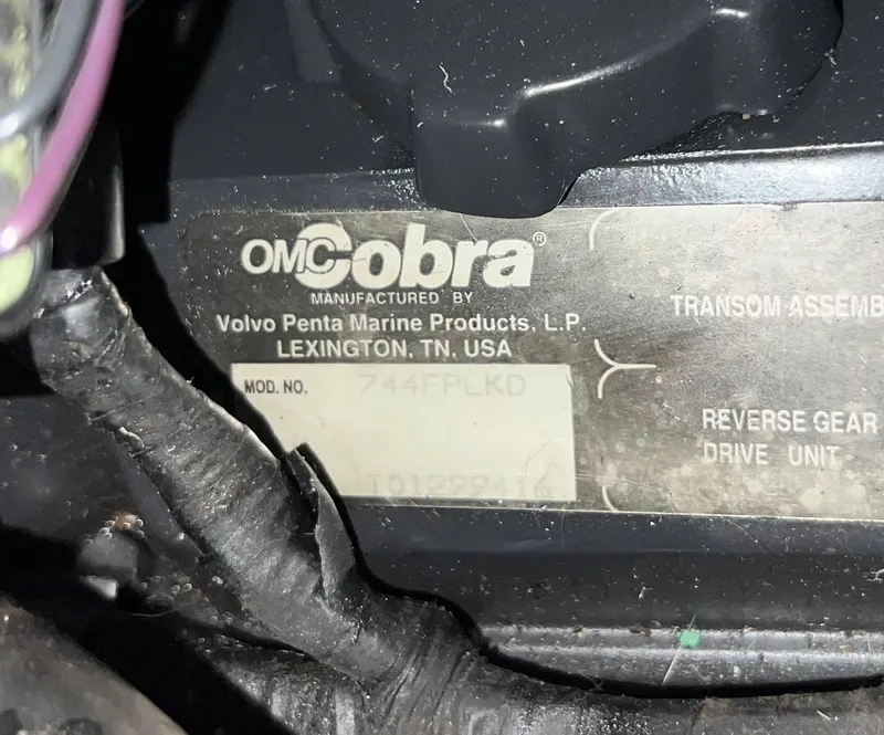 Slide: The Image of OMC Cobra engine label on 1997 Four Winns 258 Vista boat. - 34
