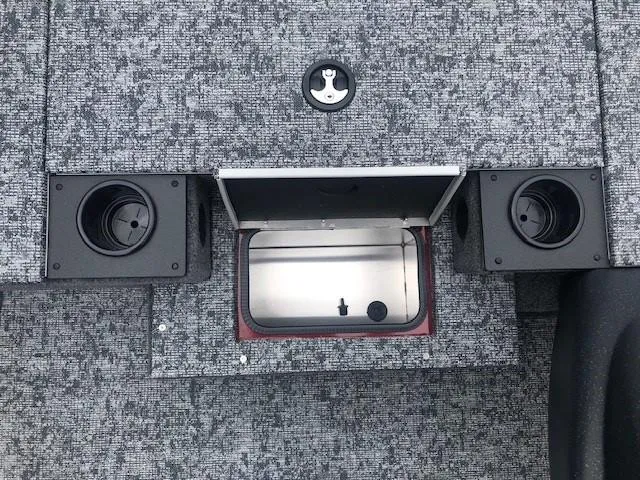 Slide: The Image of 2025 Tracker Pro Team 175 TXW boat storage compartment with cup holders. - 14