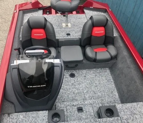 Slide: The Image of 2025 Tracker Pro Team 175 TXW boat interior with gray and red seating. - 15
