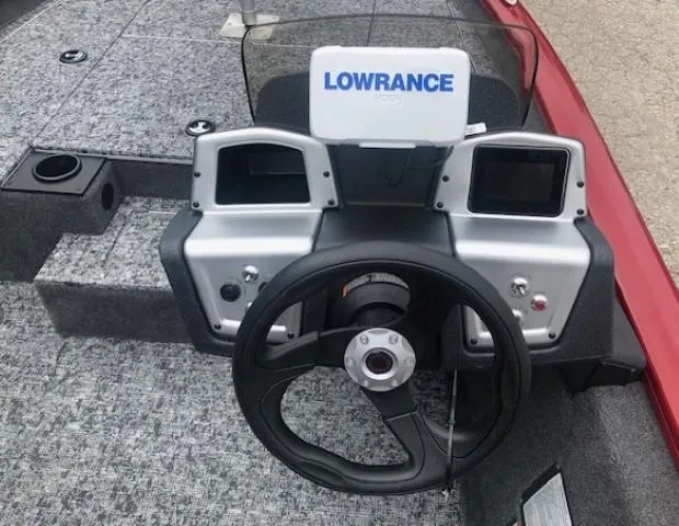 Slide: The Image of 2025 Tracker Pro Team 175 TXW boat dashboard with Lowrance fishfinder. - 18