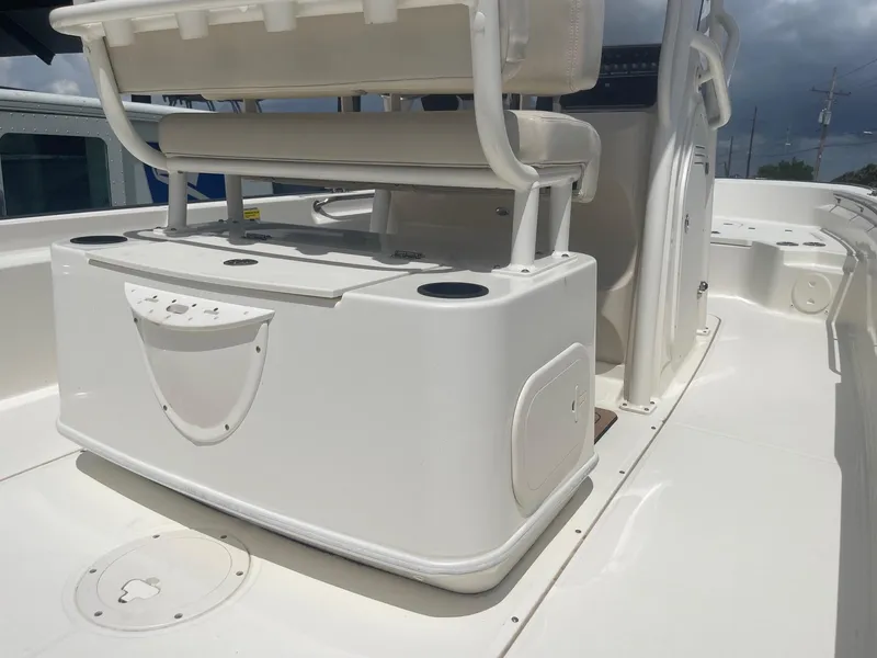 Slide: The Image of 2019 Boston Whaler 210 Montauk boat interior with seating and storage. - 19