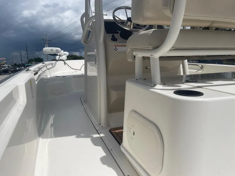 Slide: The Image of 2019 Boston Whaler 210 Montauk boat interior with console and seating. - 20