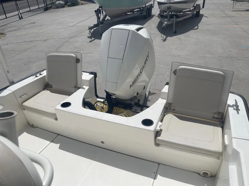 Slide: The Image of 2019 Boston Whaler 210 Montauk boat with Mercury outboard engine. - 21