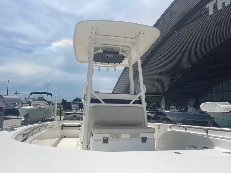 Slide: The Image of 2019 Boston Whaler 210 Montauk boat with T-top and center console. - 8