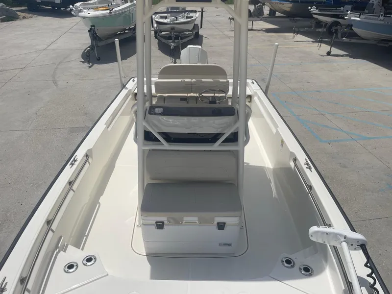 Slide: The Image of 2019 Boston Whaler 210 Montauk boat, center console, docked at marina. - 9