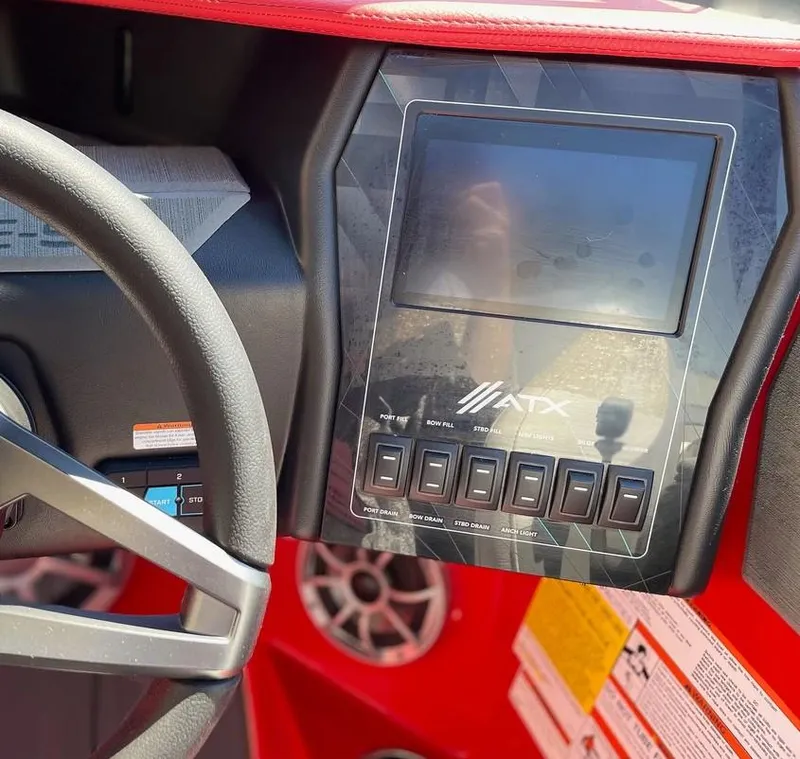 Slide: The Image of ATX 20 Type-S 2024 dashboard with touchscreen and control switches. - 15