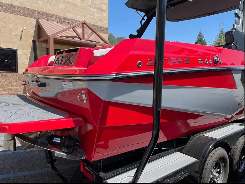 Slide: The Image of 2024 ATX 20 Type-S boat, red and gray, rear view, on trailer. - 7