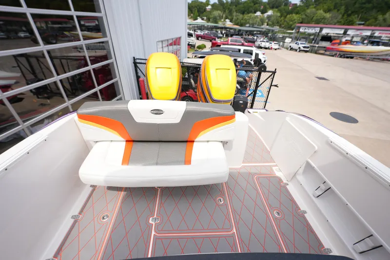 Slide: The Image of 2014 Sunsation 34 CCX boat with rear seating and twin outboard engines. - 11