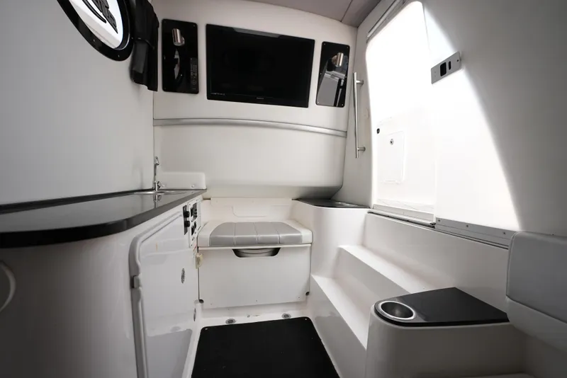 Slide: The Image of Interior of 2014 Sunsation 34 CCX boat with seating and storage. - 22