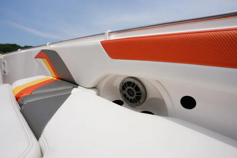 Slide: The Image of 2014 Sunsation 34 CCX boat interior with colorful upholstery and speaker. - 27