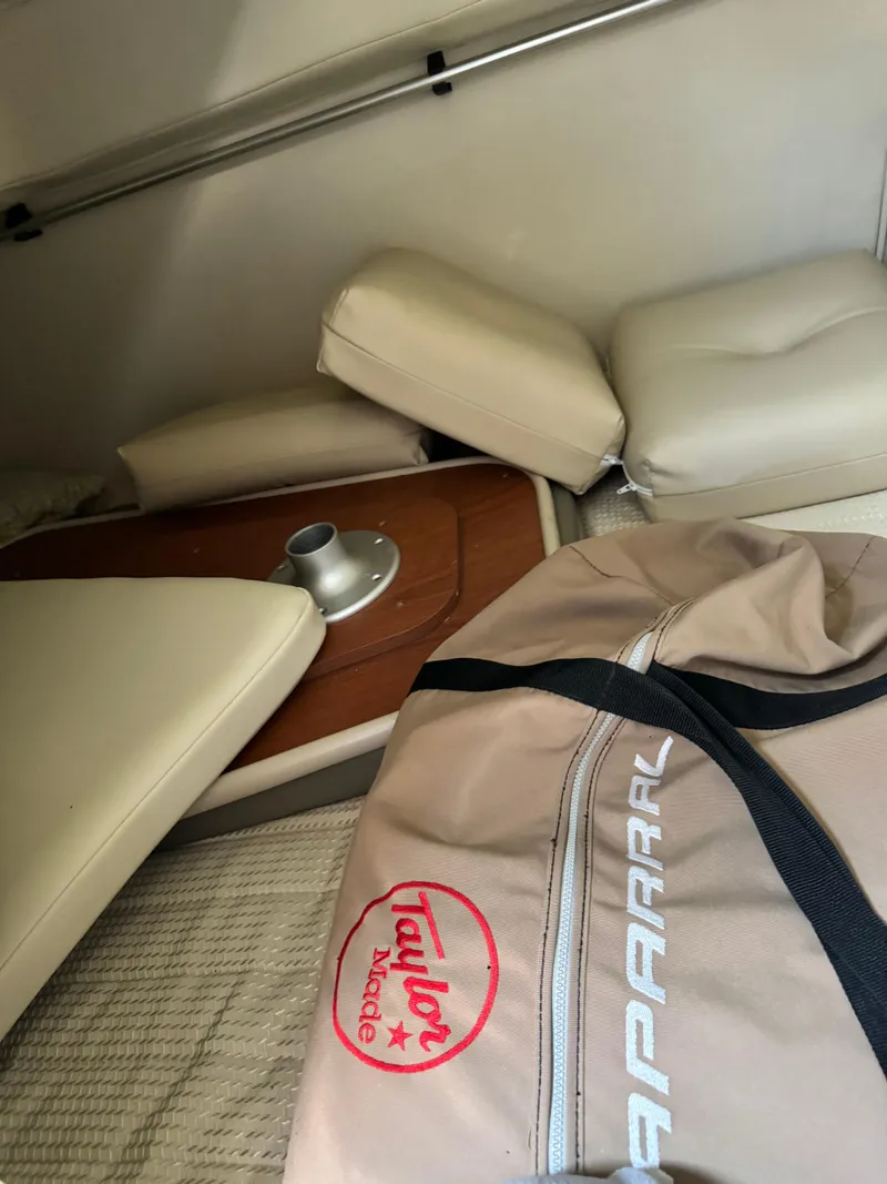 Slide: The Image of Interior of 2004 Chaparral Signature 260 boat with Taylor Made cover. - 15