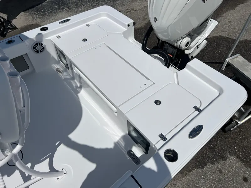 Slide: The Image of 2024 Sportsman Masters 247OE Bay Boat deck and engine view. - 12