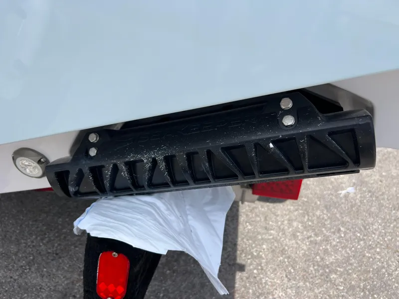 Slide: The Image of Close-up of the 2024 Sportsman Masters 247OE Bay Boat's rear detail. - 14