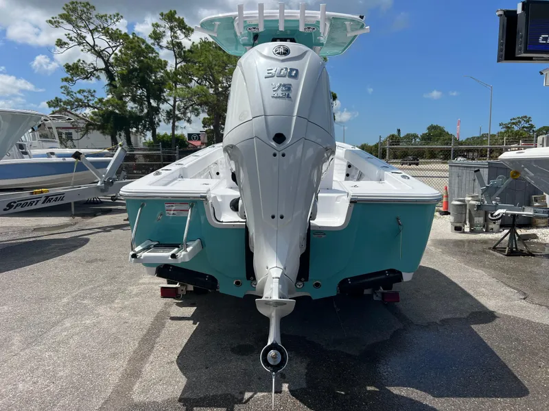 Slide: The Image of 2024 Sportsman Masters 247OE Bay Boat with Yamaha 300 engine, rear view. - 3