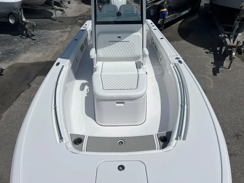 Slide: The Image of 2024 Sportsman Masters 247OE Bay Boat, front seating and deck view. - 9