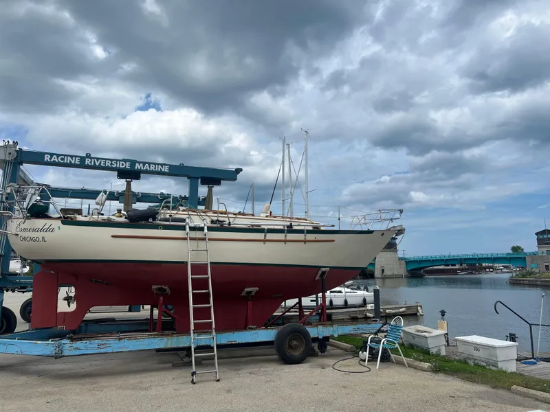 The Image of Pacific Seacraft 34 sailboat on a trailer at Racine Riverside Marine, 1994 model. - 0