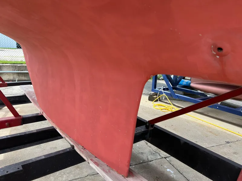 Slide: The Image of Close-up of the keel of a 1994 Pacific Seacraft 34 sailboat on a trailer. - 10