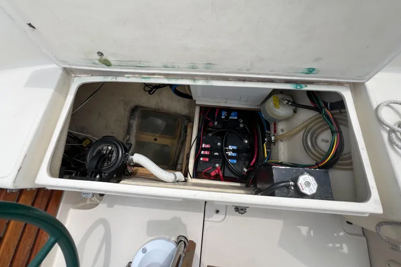 Slide: The Image of Electrical and mechanical compartment of a 1994 Pacific Seacraft 34 sailboat. - 31