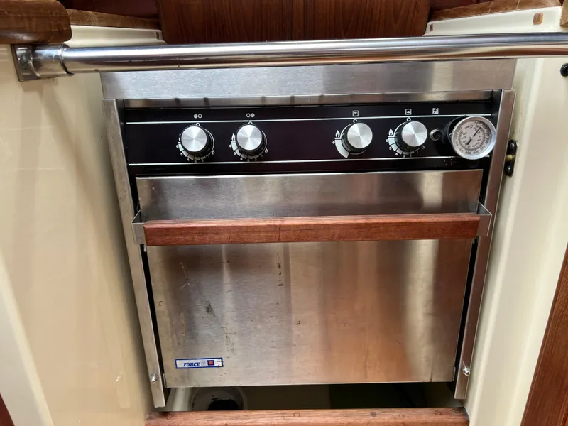 Slide: The Image of Stainless steel oven in 1994 Pacific Seacraft 34 sailboat galley. - 37