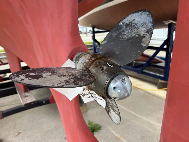 Slide: The Image of Close-up of a 1994 Pacific Seacraft 34 propeller in a boatyard. - 9