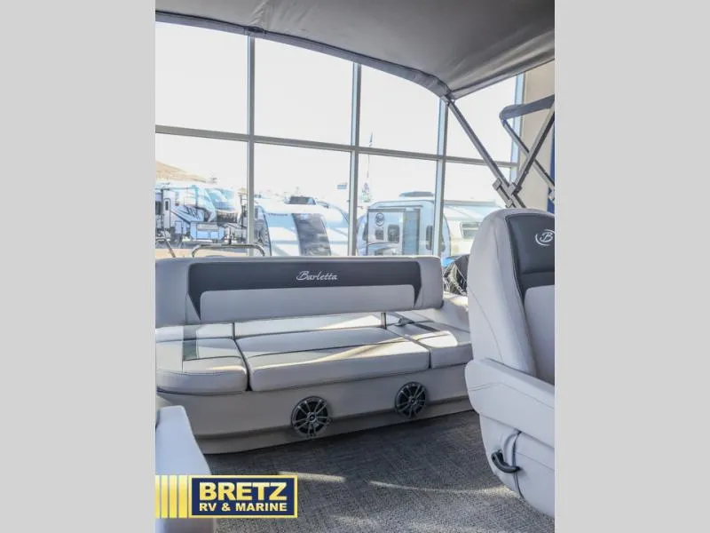 Slide: The Image of Interior of 2025 Aria A22CC boat with seating, displayed at Bretz RV & Marine. - 10
