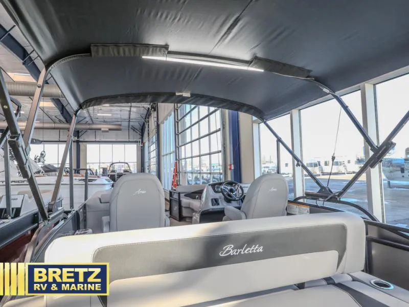 Slide: The Image of Interior view of 2025 Aria A22CC boat at Bretz RV & Marine showroom. - 14