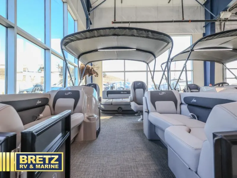 Slide: The Image of Interior of 2025 Aria A22CC pontoon boat at Bretz RV & Marine showroom. - 5
