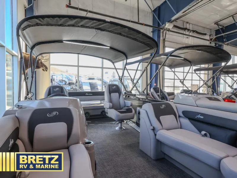 Slide: The Image of Interior of 2025 Aria A22CC pontoon boat at Bretz RV & Marine showroom. - 6