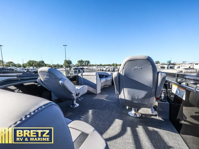 Slide: The Image of 2025 Aria Ultra-Lounge A22UC boat interior with plush seating at Bretz RV & Marine. - 17