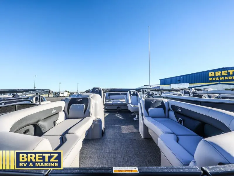Slide: The Image of 2025 Aria Ultra-Lounge A22UC pontoon boat interior at Bretz RV & Marine dealership. - 6