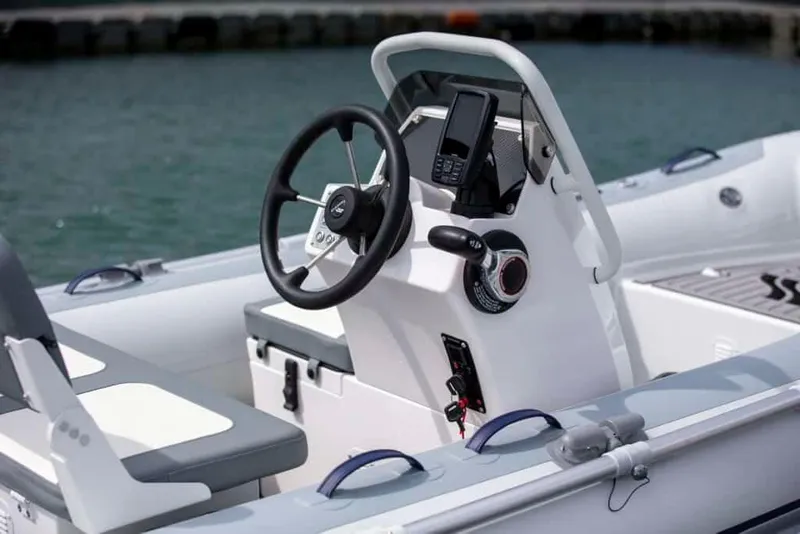 Slide: The Image of Steering console of the 2024 Highfield Classic 380 GT boat. - 7
