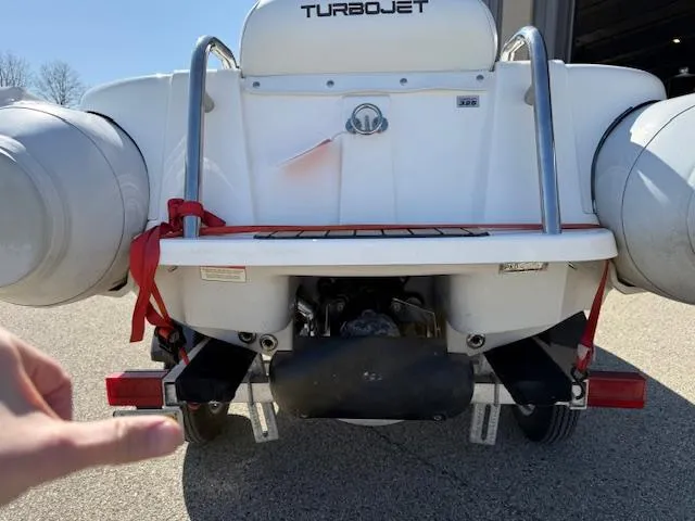 Slide: The Image of 2011 Williams Jet Tenders Turbojet 325 rear view, showcasing engine and design details. - 10