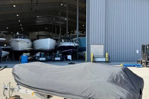 Slide: The Image of Covered 2011 Williams Jet Tenders Turbojet 325 in marina storage area. - 16