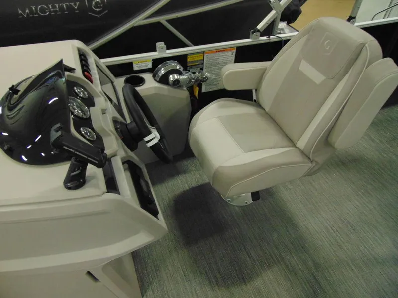 Slide: The Image of 2024 Godfrey Xperience 1880 FX 25 in. Package boat cockpit with steering wheel and captain's chair. - 10