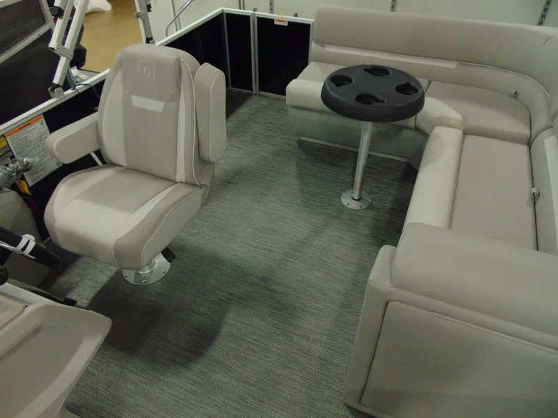 Slide: The Image of 2024 Godfrey Xperience 1880 FX 25 in. Package interior with seating and table. - 6