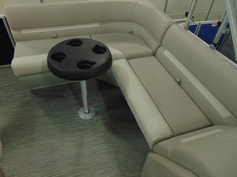Slide: The Image of 2024 Godfrey Xperience 1880 FX 25 in. Package boat seating area with cup holder table. - 8