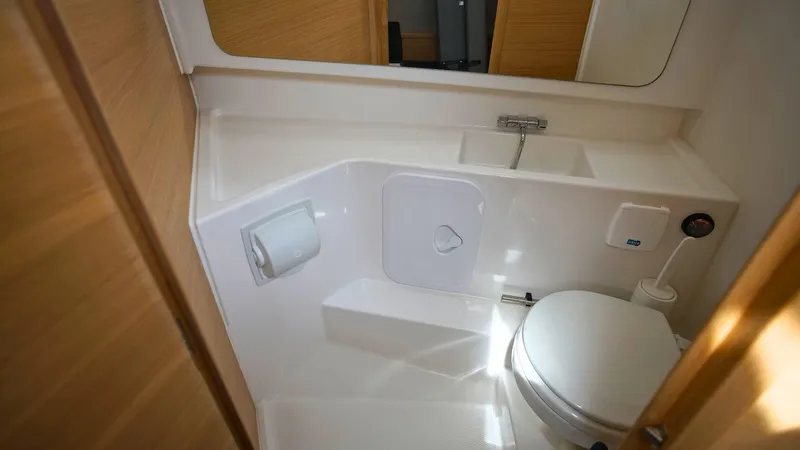 Slide: The Image of 2024 Nimbus Tender 9 #143 boat bathroom with toilet and sink. - 12