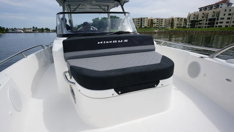 Slide: The Image of 2024 Nimbus Tender 9 #143 boat with cushioned seating on deck. - 16