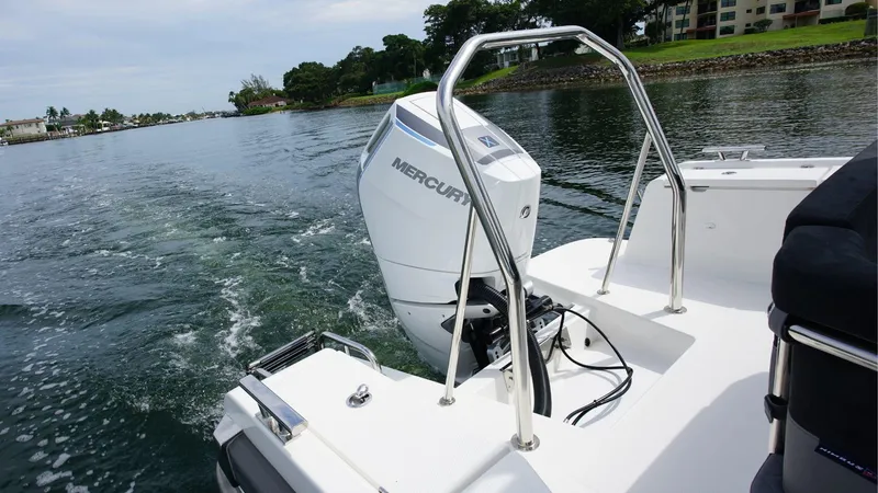 Slide: The Image of 2024 Nimbus Tender 9 #143 boat with Mercury outboard motor on water. - 3