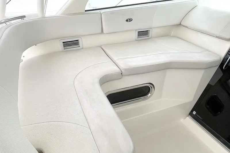 Slide: The Image of 2009 Pursuit OS 375 Offshore boat interior seating area. - 8