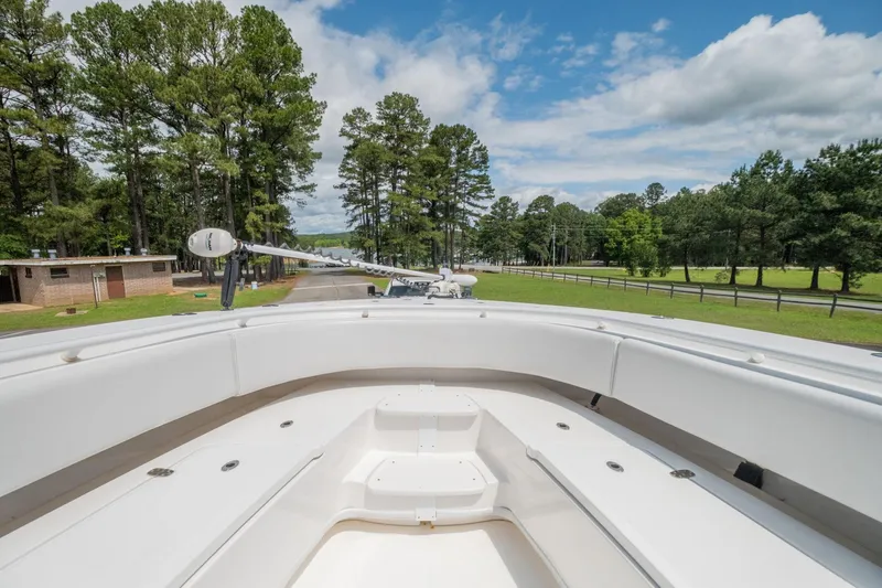 Slide: The Image of 2019 Fountain 34CC boat on trailer in a scenic park setting. - 10