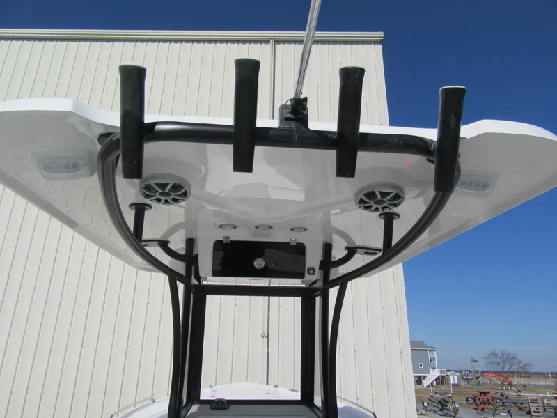 Slide: The Image of 2025 Parker 2600 Center Console boat with T-top and rod holders. - 10