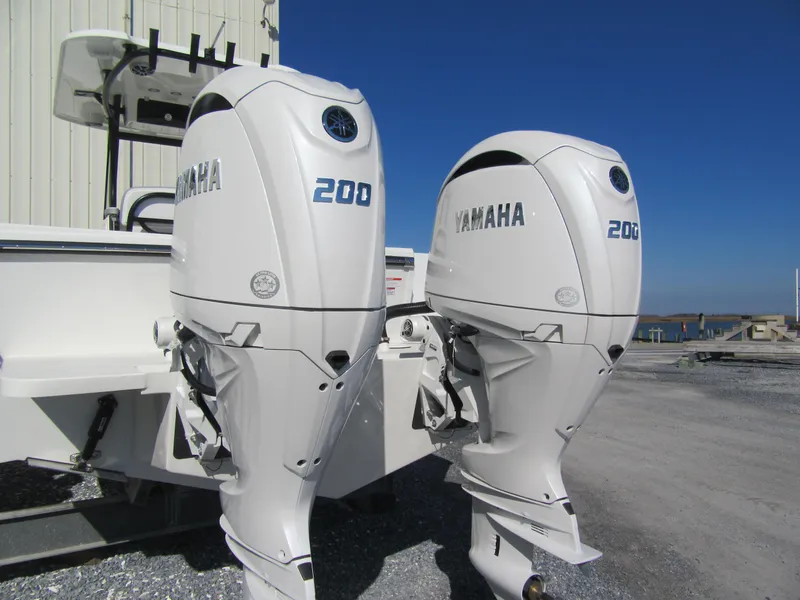 Slide: The Image of Twin Yamaha 200 outboard motors on a 2025 Parker 2600 Center Console boat. - 16