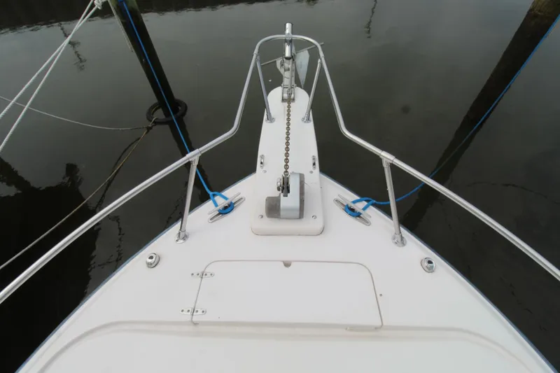 Slide: The Image of Bow of 2002 Grady-White Express 265 boat with anchor and railing. - 3