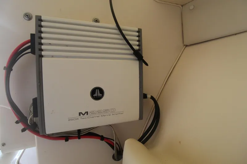 Slide: The Image of JL Audio M2250 250W two-channel marine amplifier in a 2002 Grady-White Express 265 boat. - 30