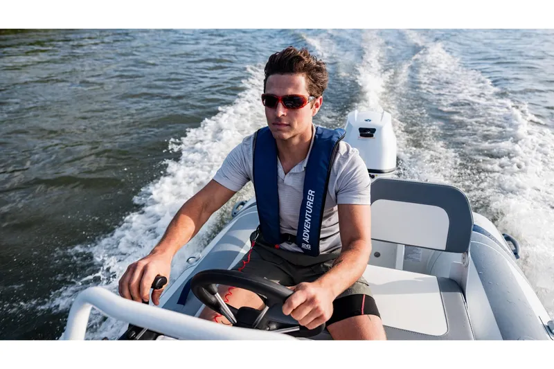 Slide: The Image of Man driving 2024 Highfield Classic 380 FCT on water. - 9