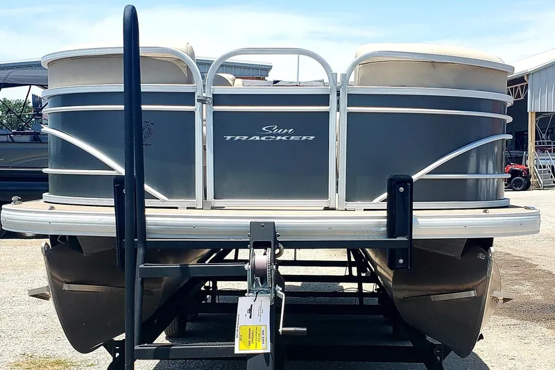 Slide: The Image of 2021 Sun Tracker Party Barge 24 pontoon boat on trailer. - 4