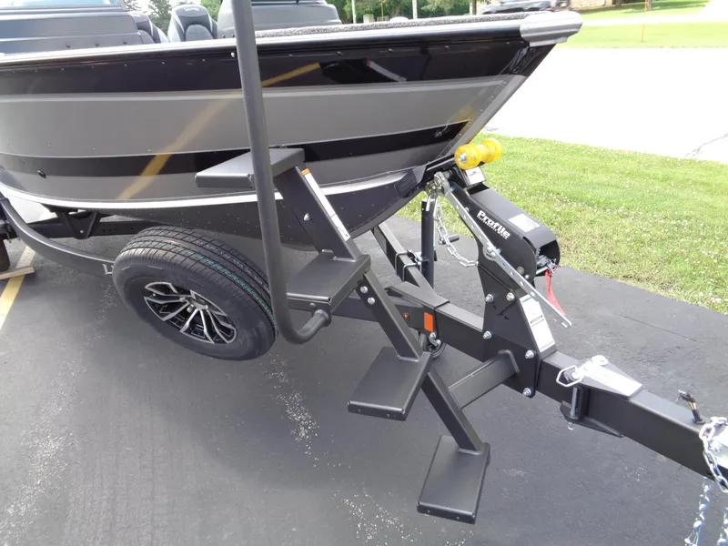 Slide: The Image of 2024 Lund 1775 Impact XS boat on trailer with steps and winch. - 13